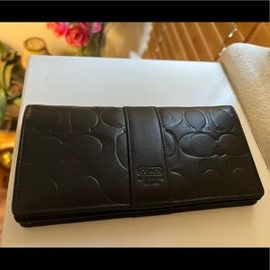 Black quilted leather coach wallet